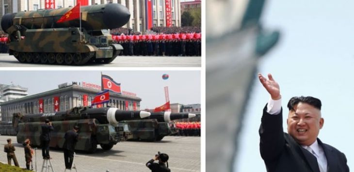 Beberapa perangkat perang Korut dipamerkan dalam parade. Kim Jong-un melambai ke pasukan militernya. (REUTERS/Damir Sagolj)