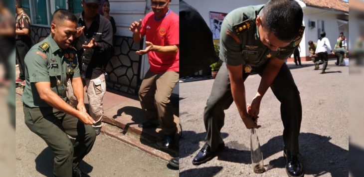 IKUT LOMBA: Kapendam III/Siliwangi Letkol Arh G Hasto ikut lomba memasukkan belut ke dalam botol.