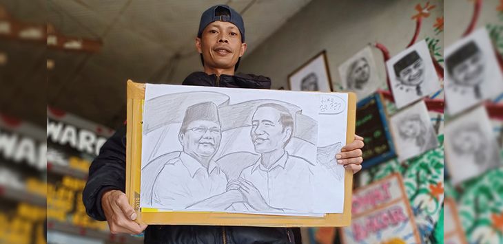 LUKISAN : Aep Wahyudin perlihatkan hasil lukisannya
(foto: Ilustrasi)